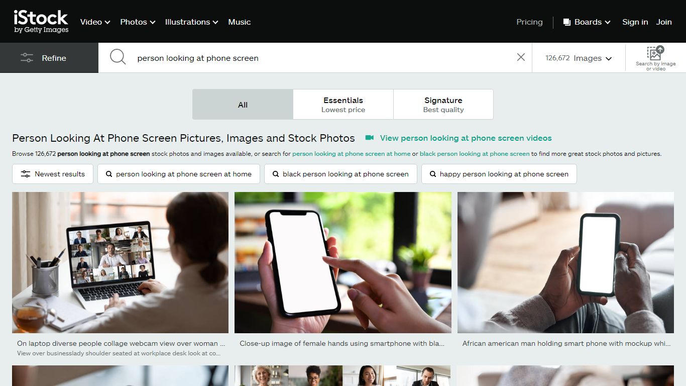 Person Looking At Phone Screen Pictures, Images and Stock Photos